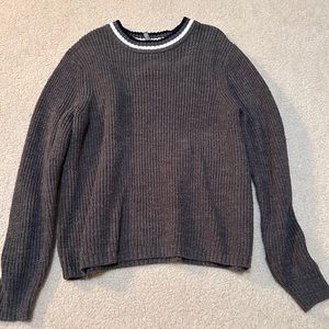dark gray sweater with striped collar